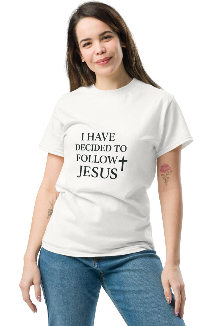 White woman smiling, wearing Tela Designs Store 100% cotton white Christian tee, "I Have Decided to Follow Jesus’" print, designed for comfort, coverage, and everyday life.